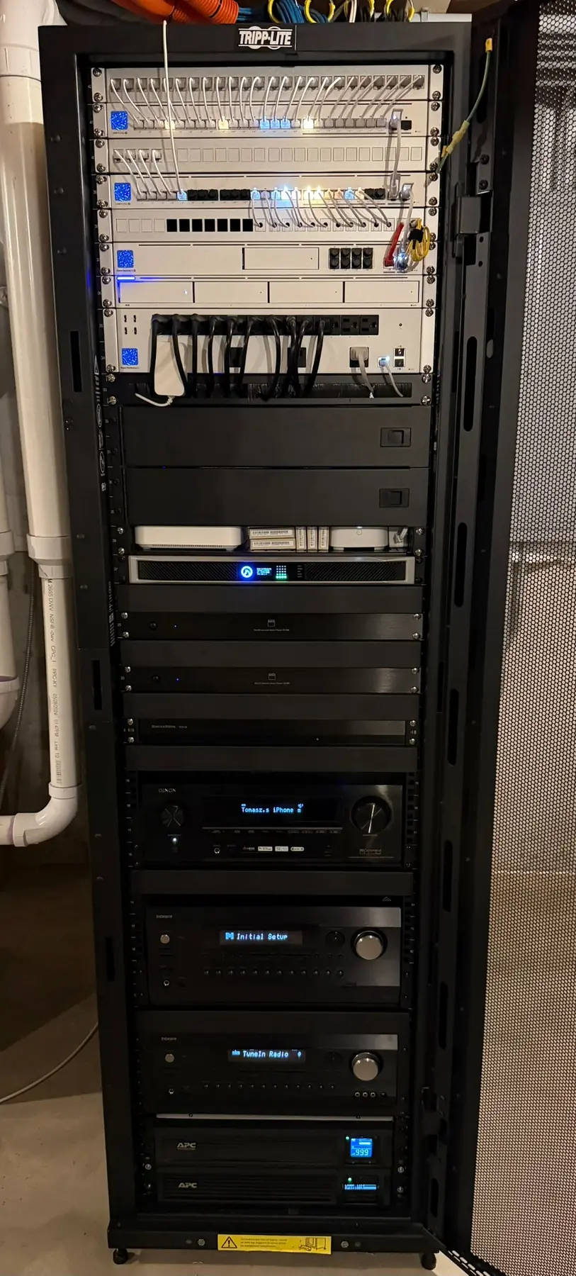 Integrated network, audiovisual and control equipment in a residential technology rack