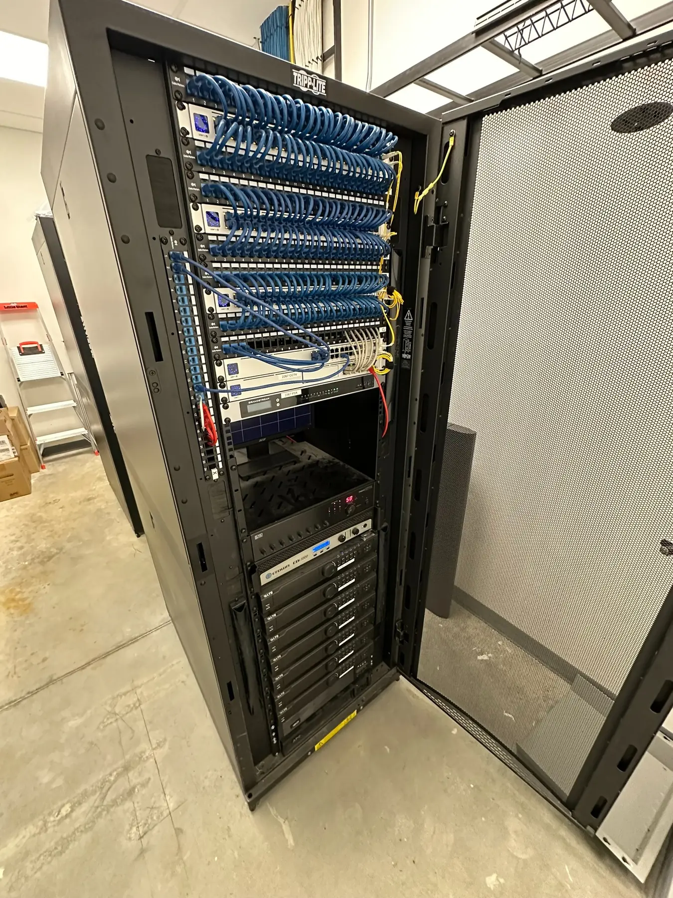 Structured cabling and network equipment organized in a commercial rack
